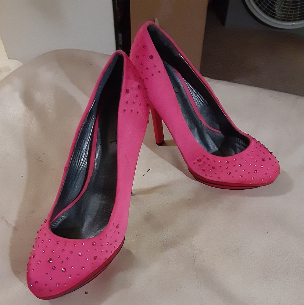 Pink closed toe pumps